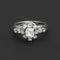 Bague Bague platine, or gris et diamants "Marguerite Sublime" 58 Facettes 1760