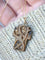 Pendentif Pendentif croix Art Nouveau en or et corne 58 Facettes