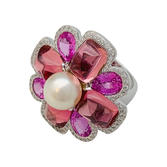 Bague 52 Bague Chanel, "San Marco", or blanc, perle, saphirs roses, tourmalines roses, diamants. 58 Facettes 31344
