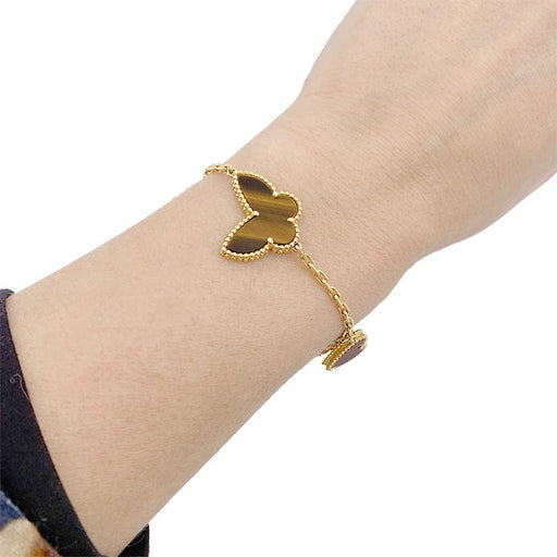 Bracelet Van Cleef & Arpels “Lucky Alhambra” yellow gold bracelet, colored stones. 58 Facettes 33558