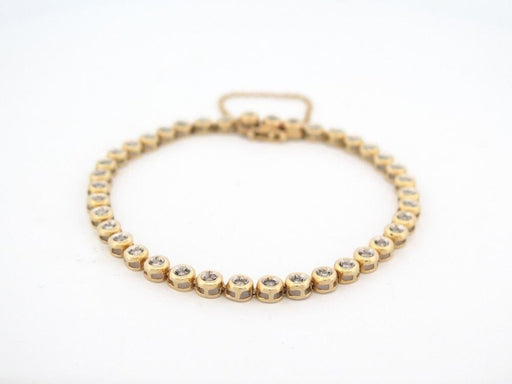 Bracelet vintage bracelet tennis serti de 39 diamants 1ct en or jaune 18k 58 Facettes 256655