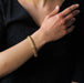 Bracelet Bracelet en or jaune ruban maille gourmette 58 Facettes 21-589