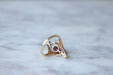 Ring Volutes Ring Garnet, diamonds, and pearls 58 Facettes