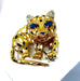 Broche Broche panthère Or Saphirs Diamants Email. 58 Facettes AB211
