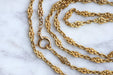 Long necklace, old gold watch chain 58 Facettes