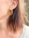 Boucles d'oreilles Boucles d'oreilles or jaune anneaux entrelacés 58 Facettes