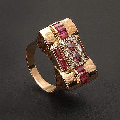Bague Bague en or jaune, gris, rubis et diamants "Folles années" 58 Facettes 1828
