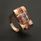 Bague Bague en or jaune, gris, rubis et diamants "Folles années" 58 Facettes 1828