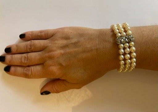 Bracelet Bracelet manchette perles blanches 58 Facettes
