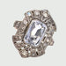 Bague 50 Sortija ART DECO 1930- 1935 de platino con diamantes y topacio azul 58 Facettes Q935A(900)