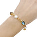 Bulgari bracelet in yellow gold, pearls, colored stones. 58 Facettes 33083