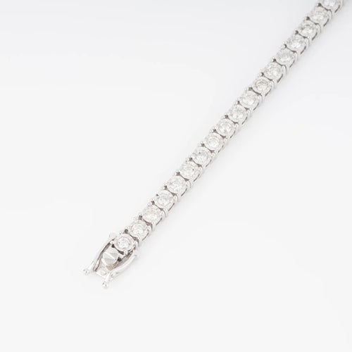 Bracelet Bracelet rivière et or gris orné de diamant 58 Facettes 1