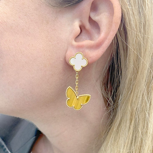 Earrings Van Cleef & Arpels "Lucky Alhambra" earrings in yellow gold, white mother-of-pearl, tiger's eye. 58 Facettes 33555