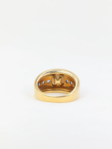 Bague Bague vintage en or jaune, perle et saphirs 58 Facettes 705