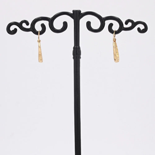 Boucles d'oreilles Boucles d'oreilles créoles or jaune ciselé facetté 58 Facettes CVBO18