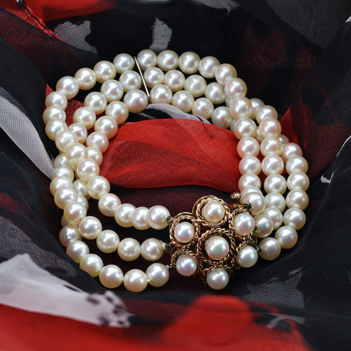 Bracelet Bracelet perles 3 rangs et fermoir fleur 58 Facettes 22-469