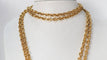 Collier Chanel - sautoir vintage en métal doré 58 Facettes 32118