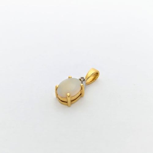 Pendentif Pendentif en or jaune et opale 58 Facettes 27529