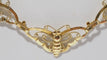 Collier Collier ancien en or jaune aux Papillons 58 Facettes 31351
