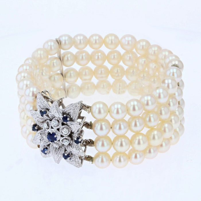 Bracelet Bracelet 4 rangs de perles fermoir or blanc saphirs diamants 58 Facettes 22-125
