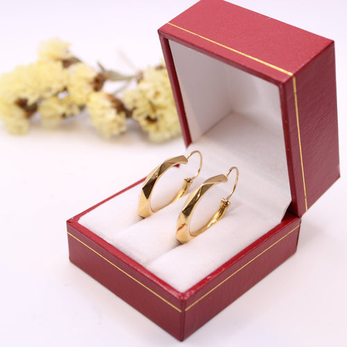 Boucles d'oreilles Créoles en or jaune 58 Facettes