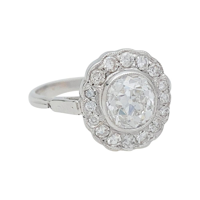 Bague 55 Bague marguerite en or blanc et diamants. 58 Facettes 31177