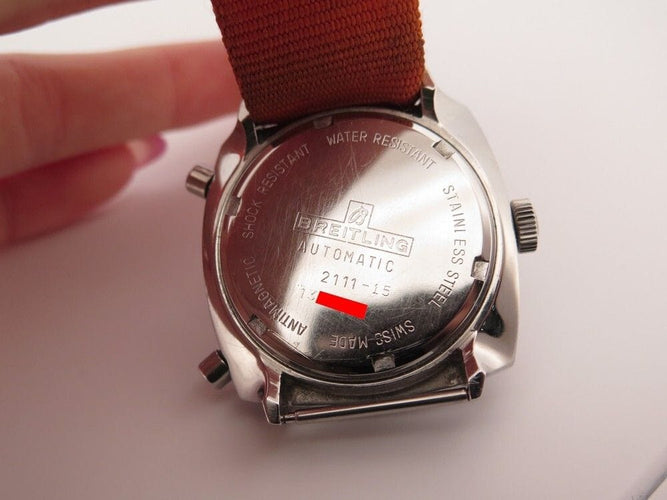 Montre vintage montre BREITLING top time 2211-15 38 mm automatique acier 58 Facettes 251742