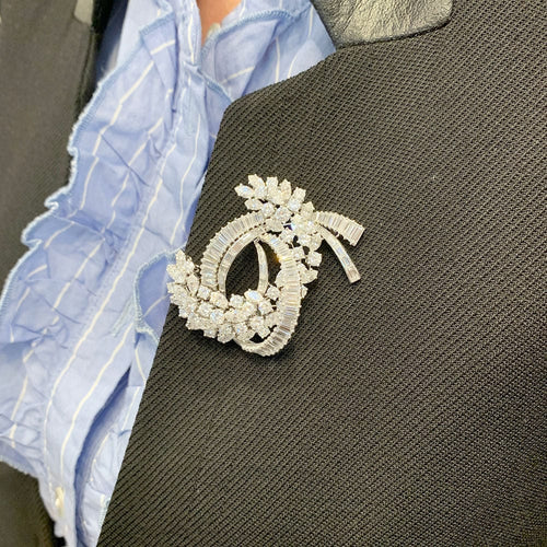 Broche Broche "Volute" en platine or blanc, diamants. 58 Facettes 31490