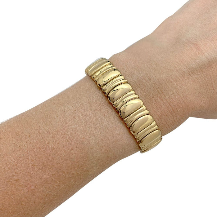 Bracelet Bracelet Cartier, "Casque d'Or", en or jaune. 58 Facettes 31928