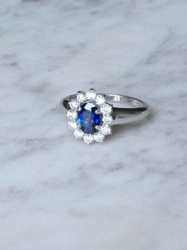 Bague saphir entourage diamants sur or blanc 58 Facettes