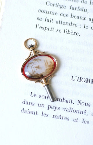 Pendentif Clef de montre paysage miniature sur verre 58 Facettes
