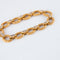 Bracelet or jaune, maillons texturés et diamants 58 Facettes