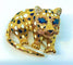 Broche Broche panthère Or Saphirs Diamants Email. 58 Facettes AB211