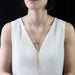 Long necklace in old gold twisted oval curb chain and its slider 58 Facettes CVCO11-22-085