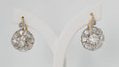 Boucles d'oreilles Dormeuses en or bicolore serties de diamants 58 Facettes 31425