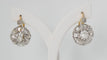 Boucles d'oreilles Dormeuses en or bicolore serties de diamants 58 Facettes 31425