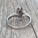 Ring 55 Wave ring in white gold, diamonds 58 Facettes 6