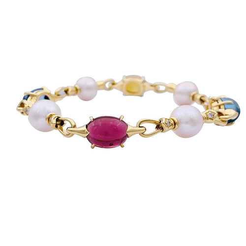 Bracelet Bracelet Bulgari en or jaune, perles, pierres de couleur. 58 Facettes 33083