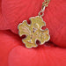 Antique cross pendant in rose gold fleur de lys 58 Facettes CVP72