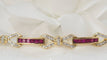 Bracelet Bracelet vintage en or jaune, rubis calibrés et diamants 58 Facettes 31672
