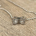 Necklace Flower necklace in white gold 58 Facettes 269