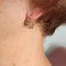 Boucles d'oreilles Paire de dormeuses anciennes, serties de perles 58 Facettes