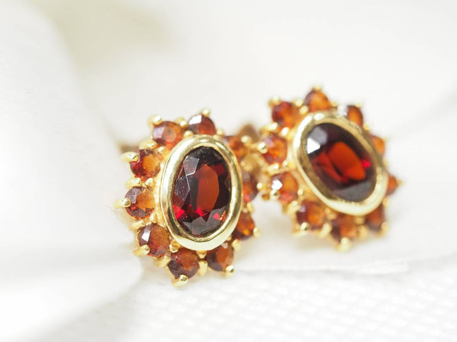 Boucles d'oreilles Boucles d'oreilles marguerite or jaune et grenats 58 Facettes 25806