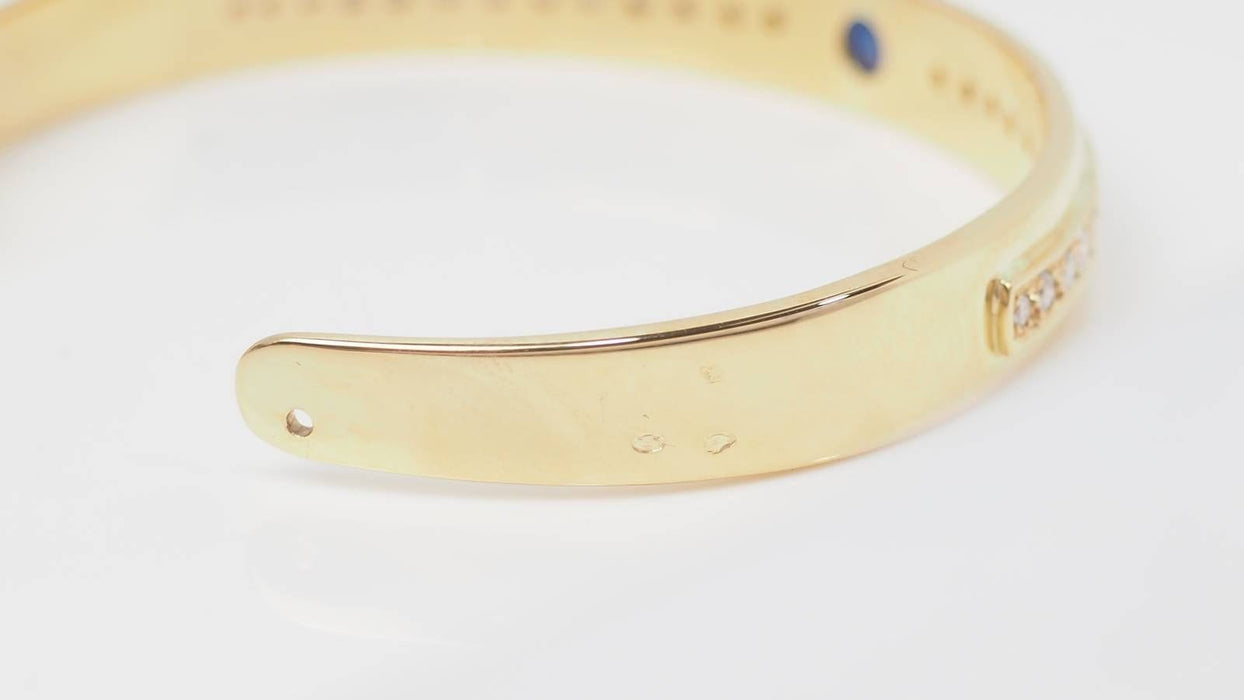Bracelet Bracelet jonc en or jaune, saphir et diamants 58 Facettes 32539
