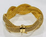 Luminous bracelet braided bracelet in yellow gold 58 Facettes