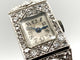 Montre Montre Art Déco platine & or blanc, diamants 2.44 cts 58 Facettes 07/07 - 16