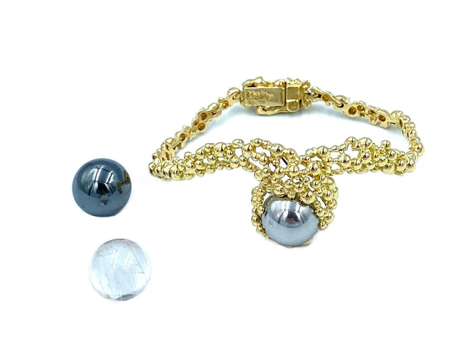 Bracelet GILBERT ALBERT. Bracelet en or jaune et billes interchangeables 58 Facettes