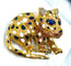 Broche Broche panthère Or Saphirs Diamants Email. 58 Facettes AB211