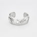 Hermès bracelet - Silver open cuff bracelet 58 Facettes