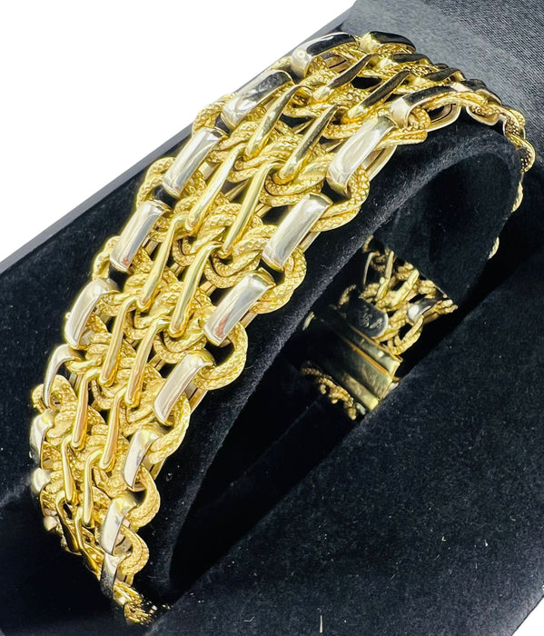 Bracelet bracelet en or en maille souple années 1960 58 Facettes 7374 A